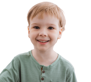 Young child with short light brown hair wearing a light green shirt, smiling while facing the camera against a plain white background.